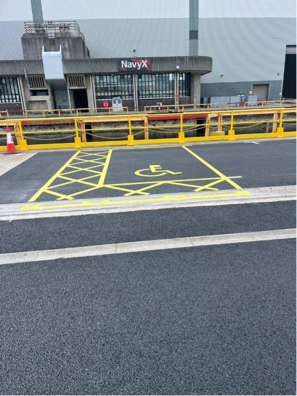 parking bay with yellow paint